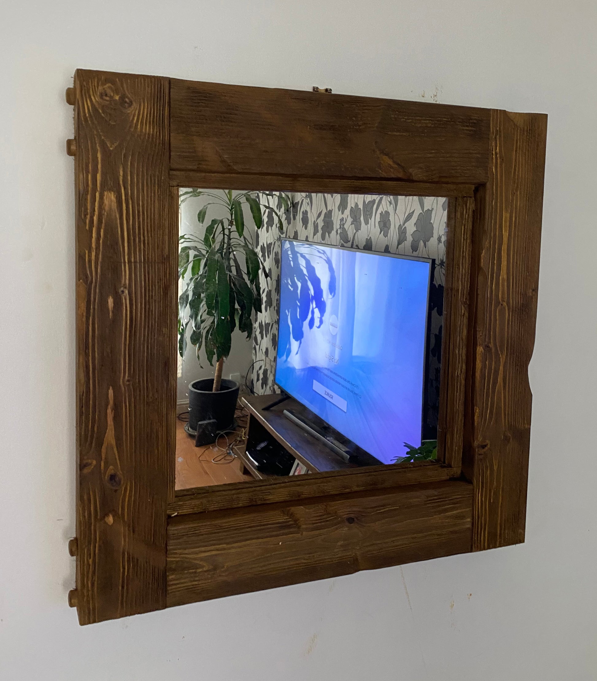 Chunky wooden mirror made from distressed timber and aged perfectly