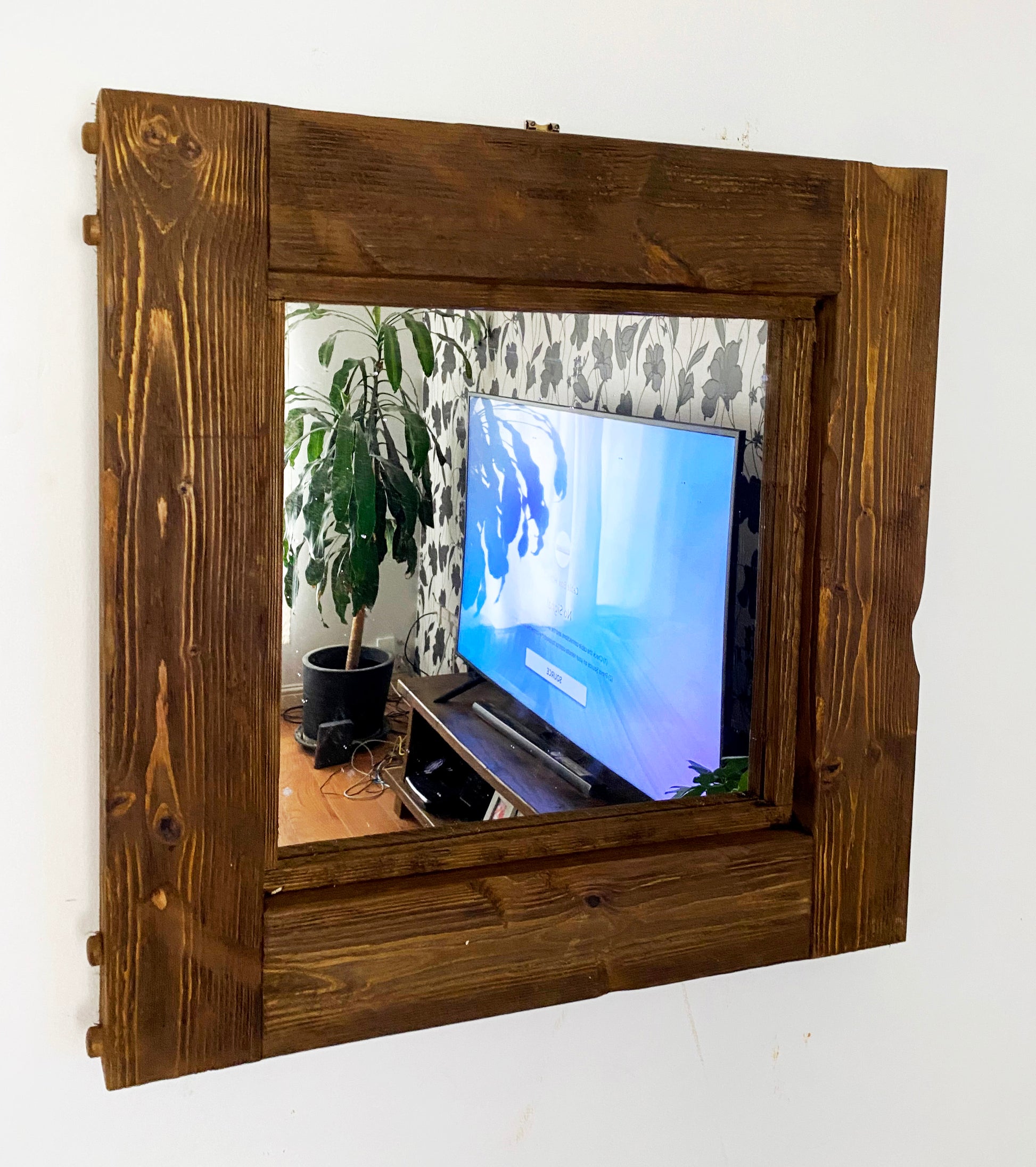 Chunky wooden mirror made from distressed timber and aged perfectly