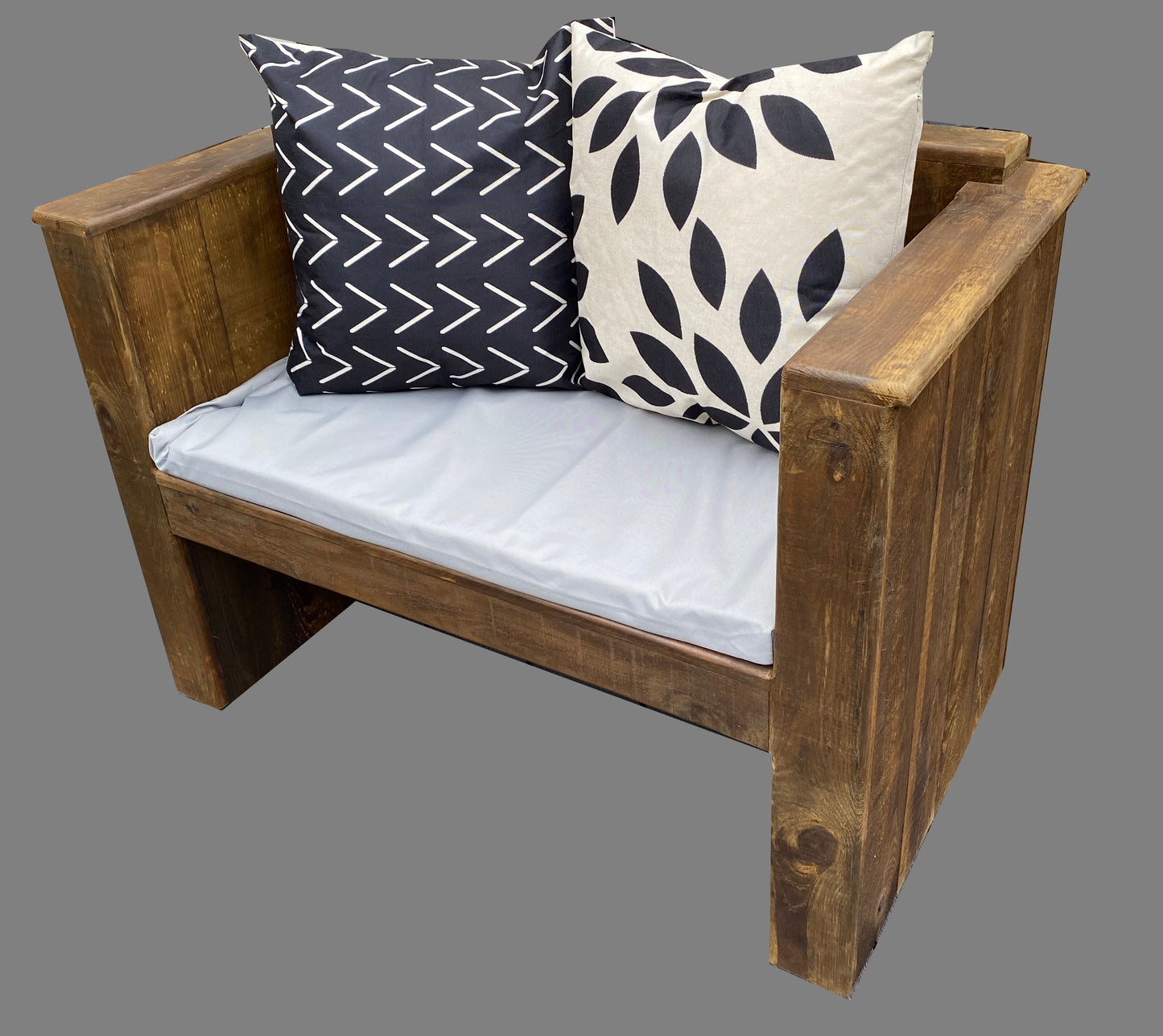 Sleeper style outdoor wooden sofa, made from distressed timber, treated for outdoor use